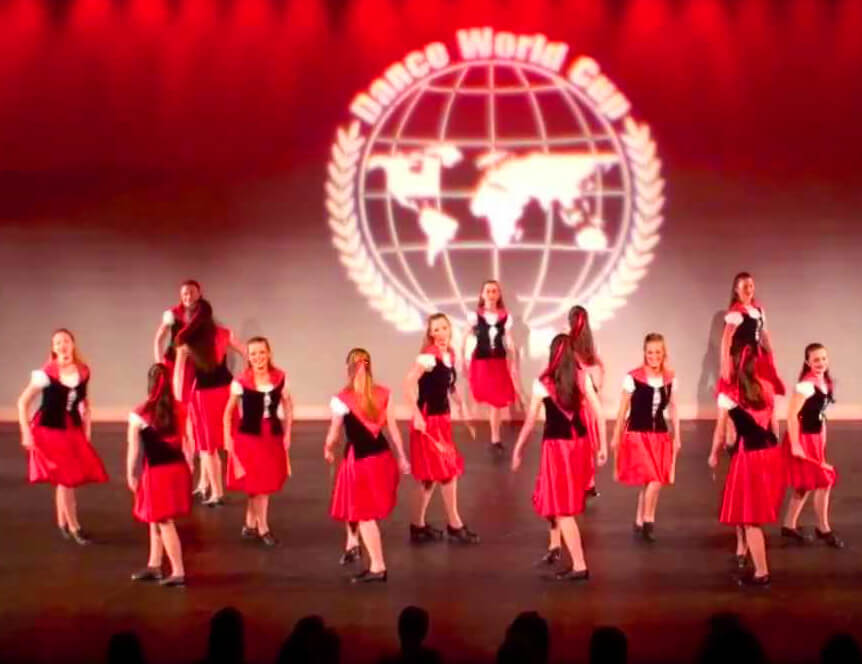Canada hip hop dance crew performing on stage with northern lights